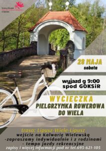 Plakat z informacją o wycieczce ''Pielgrzymka Rowerowa do Wiela'', tłem jest rower na tle lasu, po lewej stronie jest logo GOKSiR, po prawej data, godzina i miejsce wyjazdu, na dole trasa i informacje